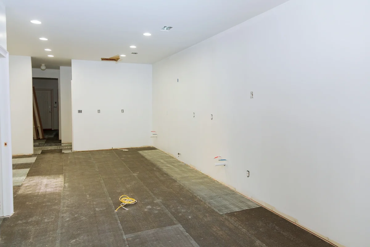 Popcorn ceiling removal cost Toronto showing smooth finished ceiling after removal and repaint